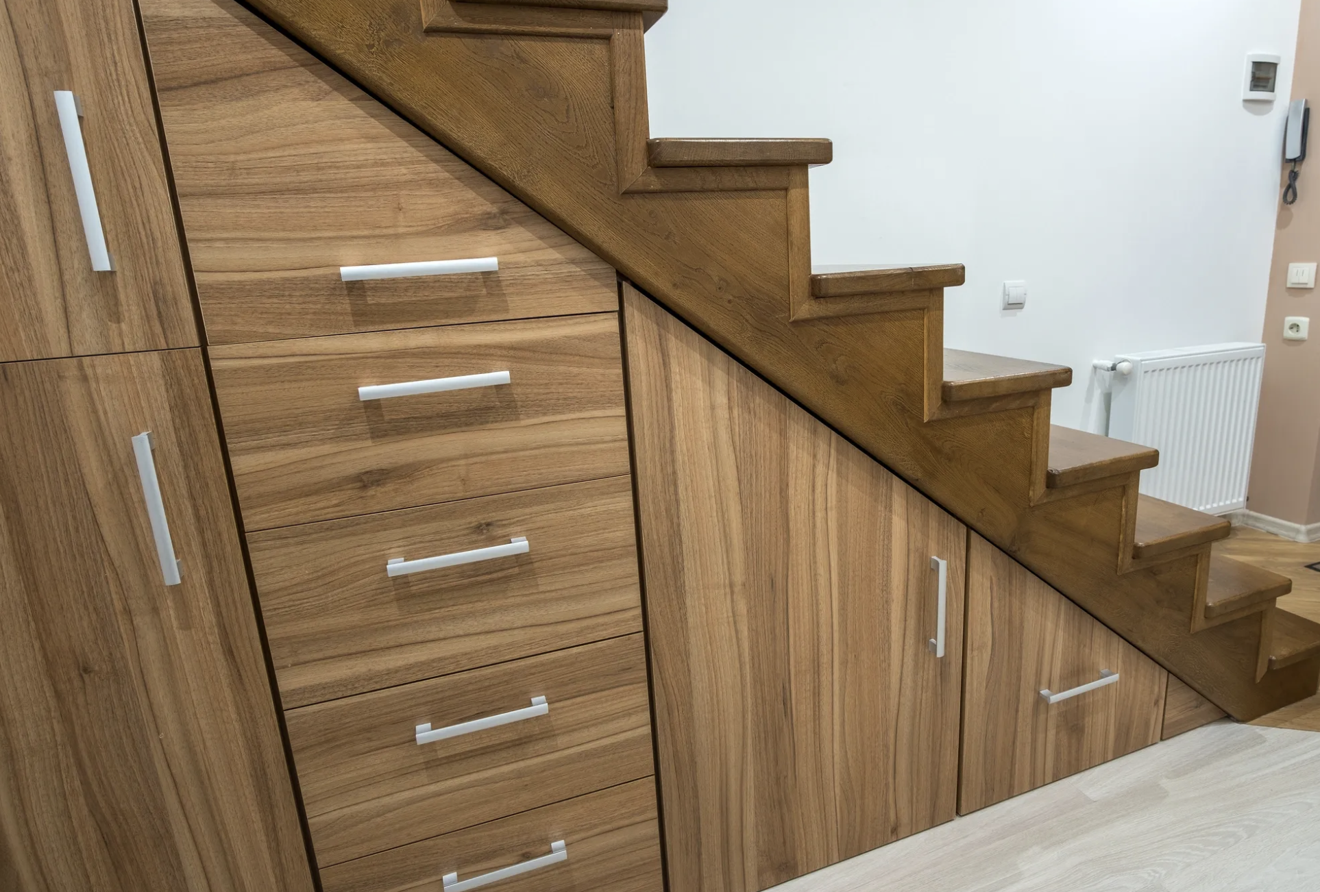 Bespoke staircase refurbishment and under-stair storage in Newmarket by Cromwell Interiors